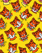 Playful Orange Tiger Faces Yellow Background Rug
