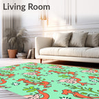 Whimsical Orange Figures Green Foliage Rug