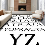 Elegant Serif Alphabet Black White Rug