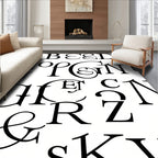 Elegant Black Serif Alphabet Collage Rug