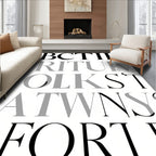 Black and White Serif Type Abbreviation Rug