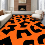 Bold Black Abstract Shapes Orange Rug