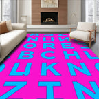 Bold Blue Alphabet On Pink Rug